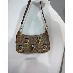 Coach CN507 Disney X Coach Nolita 19 In Signature Jacquard IN Khaki Redwood